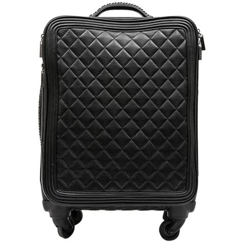 chanel black roller bag|Chanel luggage.